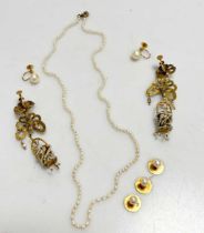 A pair of seed pearl ear pendants tested as 9ct gold, weight 10.1g (A/F), together with a seed pearl