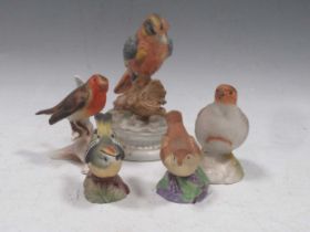 A collection of five 20th century ceramic birds. Royal Worcester Wren and Robin, Ainsley Grey