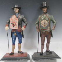 Two Black Forest Peddlar timepiece painted figures, larger 40cm high