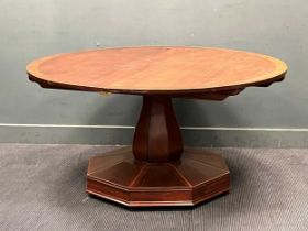 A mahogany extending dining table with an octagonal base, with one leaf, 78 x 152.5cm unextended