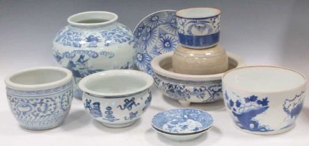 Nine Asian blue and white porcelain bowls, dishes and vases, including Chinese wares; and a plain