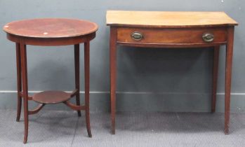 A mid 19th century mahogany bow fronted side table with single drawer, set on square section legs,