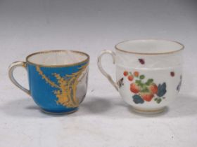 An 18th century Sèvres coffee cup, the bleu celeste ground painted with a portrait of Madame