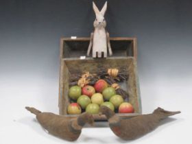 Two painted pine trays containing faux apple candles, 2 model pigeons,