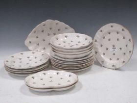 A Derby dessert service, circa 1810, decorated with scattered floray sprigs in grey and black,