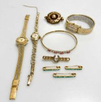 Three gold plated wrist watches, together with a cased set of three turquoise brooches, tested as