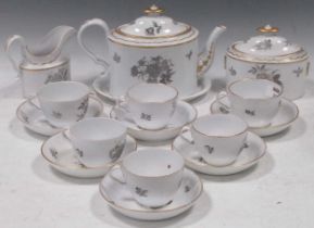 A Spode tea service circa, 1805-10, decorated with scattered flower sprigs in grey; together with