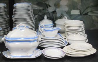 19th century creamware doll's house dinner service and another with blue and white border by