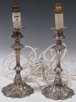 A pair of silver plated candlestick lamps, 32cm high including fitting (2)