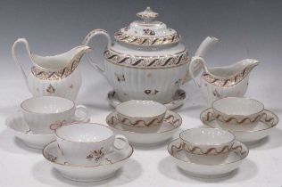 A Chamberlain Worcester fluted teapot, cover and stand and a two cream jugs, circa 1795, decorated