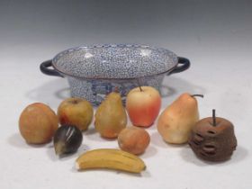 A collection of wax and painted marble fruit in a continental two handled ceramic dish. (10)