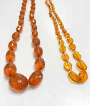 An amber necklace, together with a constituted amber necklace, another bead necklace, and a