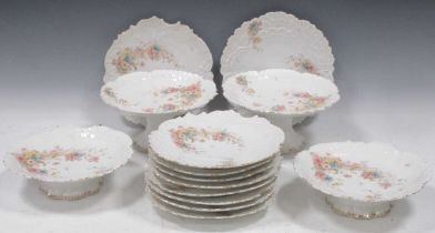 A 19th century porcelain dessert service, printed and painted with flowers, comprising four comports