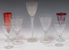 Quantity red lustre glasses, 9 wine, 6 tall champagne, together with a pair of glasses etched with