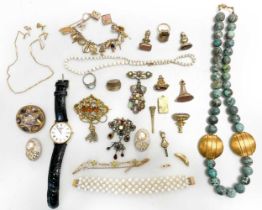 A collection of jewellery including an opal bead necklace and bracelet, an enamel brooch, a pair
