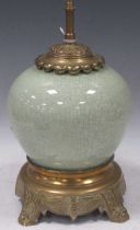 A gilt metal mounted globular celadon table lamp base, 26cm high Base with minor dents Areas of