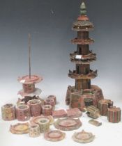 A sectional Chinese soapstone Pagoda and sections of fountain