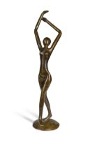 A small bronze model of a dancer,