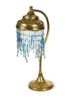 An Art Nouveau brass desk lamp,