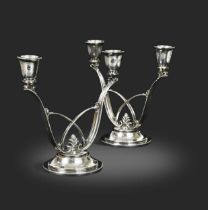 Harald Nielsen for Georg Jensen, a pair of Danish metalwares twin-branch candelabra,