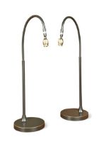 A pair of contemporary bronzed metal reading or bedside lamps,