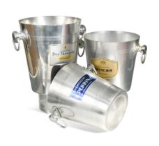 Three assorted mid-century polished alloy champagne coolers,