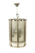 An Art Deco-style polished steel hall lantern,