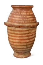 A large mid-century terracotta Moroccan pot,