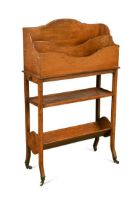 An early 20th century oak book stand by Warings (Waring & Gillow), circa 1910,