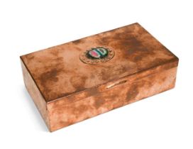 An Arts & Crafts repoussé decorated copper cigarette box,