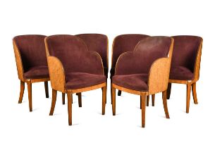 In the manner of Harry & Lou Epstein, a set of six Art Deco walnut cloud-back dining chairs,