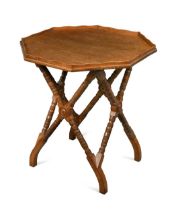 An Aesthetic period oak occasional table,