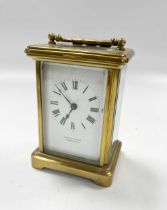 A brass carriage timepiece, retailed by Reed & Son, Cambridge, 12cm high