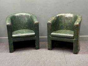 A near pair of 20th century green leather covered tub armchairs. 78cm x 70 cm x 66cm The leather