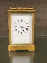 A French brass carriage clock by Rollin, with gong striking movement, 14.5cm high clock movement