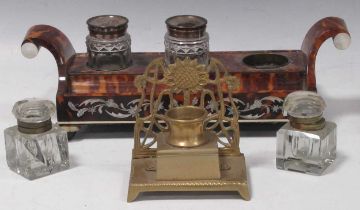 A 19th century mother-of-pearl inlaid tortoiseshell desk stand, together with another brass