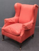 An Edwardian wingback armchair 194 x 75 x 80cm
