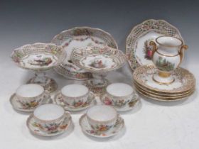 A set of four KPM Berlin plates painted with flowers with pierced borders; items of Dresden
