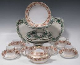 A Regency part tea service with printed fruit and vine pattern to include tea cups, saucers, milk