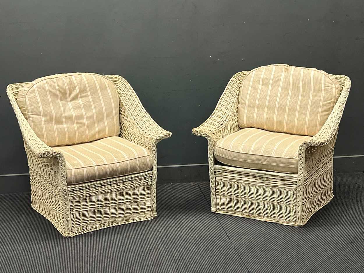 A pair of white painted wicker conservatory armchairs 89cm High x 84cms wide x 80cm deep (2)
