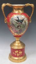 A Victorian hand painted twin handled vase on stand, decorated with a nesting bird, signed, 59cm