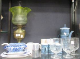 A decorative shade brass oil lamp, five Swedish cups and saucers, a Rye coffee set and three glass