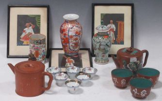 An Oriental terracotta teapot & other Chinese and Japanese ceramics Three earthernware rice bowls