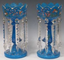 A pair of Victorian blue glass lustres, 34cm high One chipped, one lustre loose, rubbing to