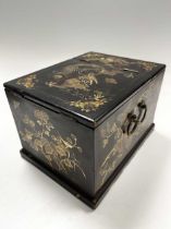 A small black lacquer Japanese box with mirror