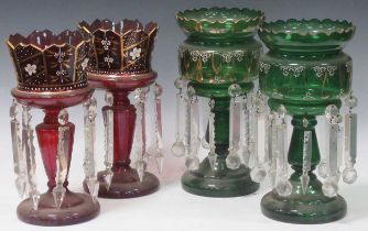 Two pairs of Victorian glass lustres, 33cm high and 31cm high (4)