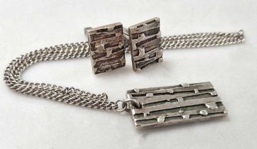 A pair of cufflinks and pendant by Brian Asquith (2)