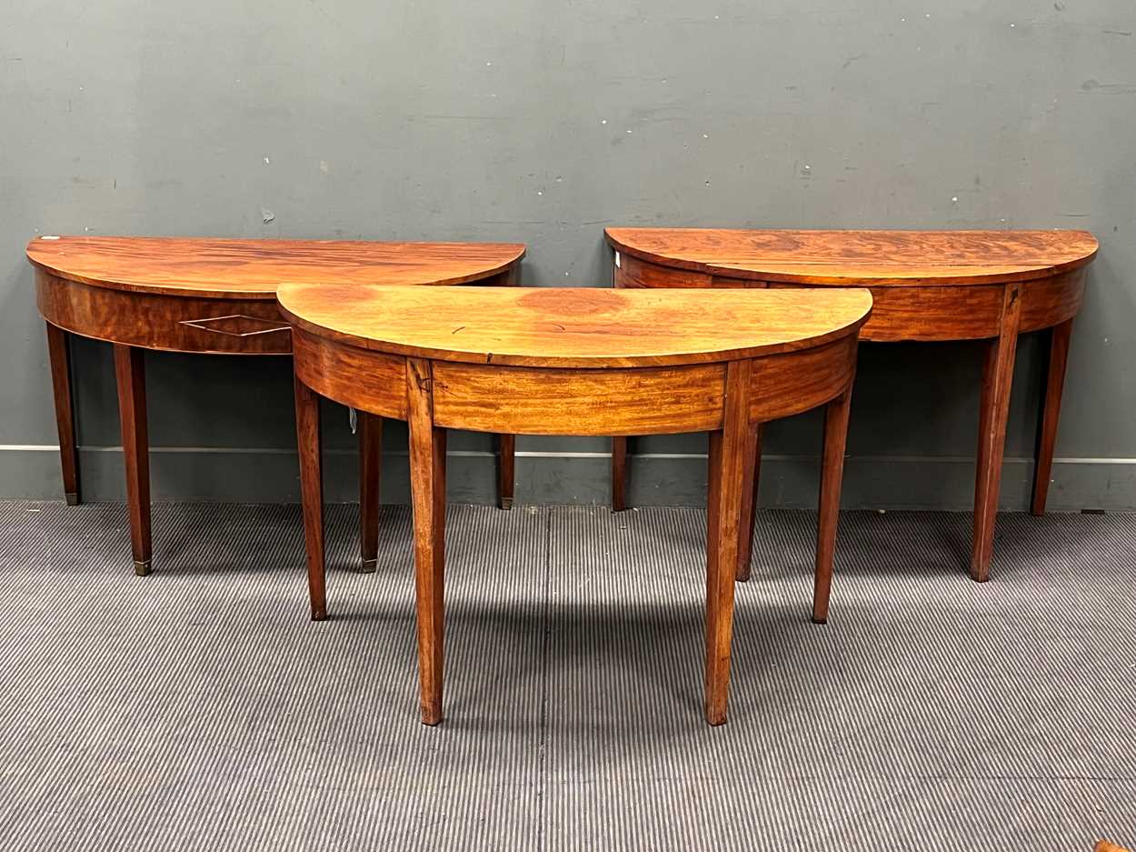 Three George III and later mahogany demi lune side tables (adapted) 75cm x 122cm x 59cm, 71cm x