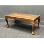 A carved wood Indian coffee table, 20th century, 43 x 102 x 52cm