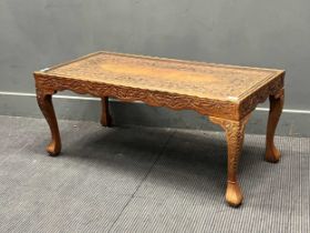 A carved wood Indian coffee table, 20th century, 43 x 102 x 52cm